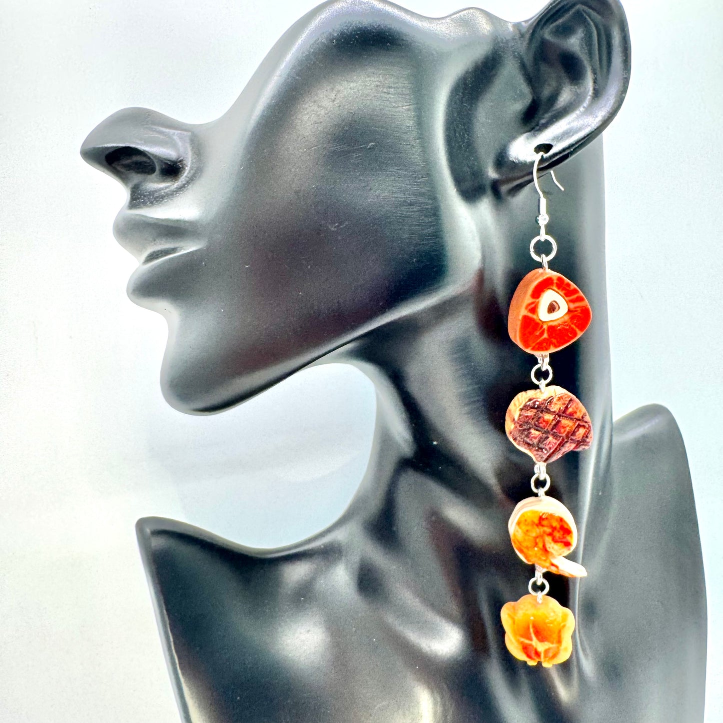 Carnivore Earrings
